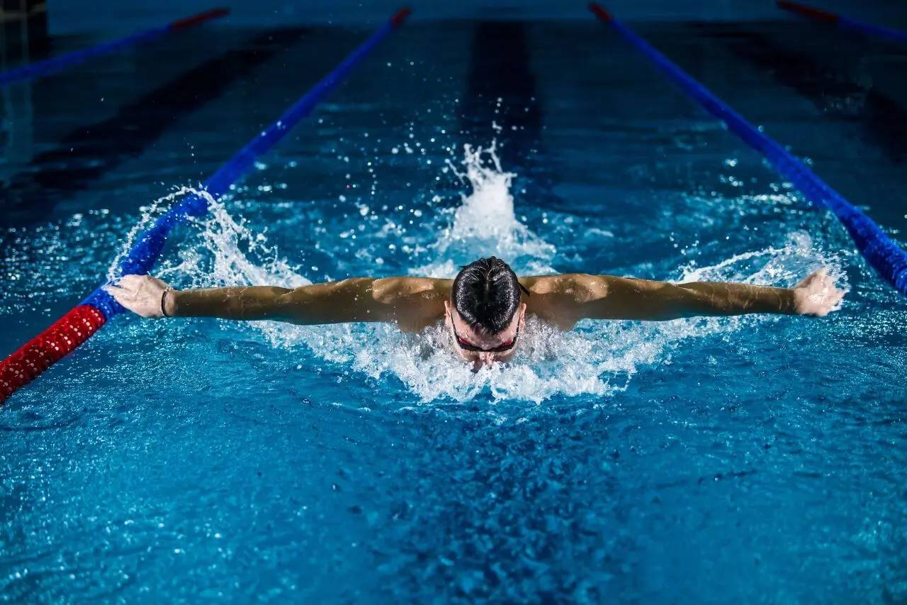swimmer swimming in a pool